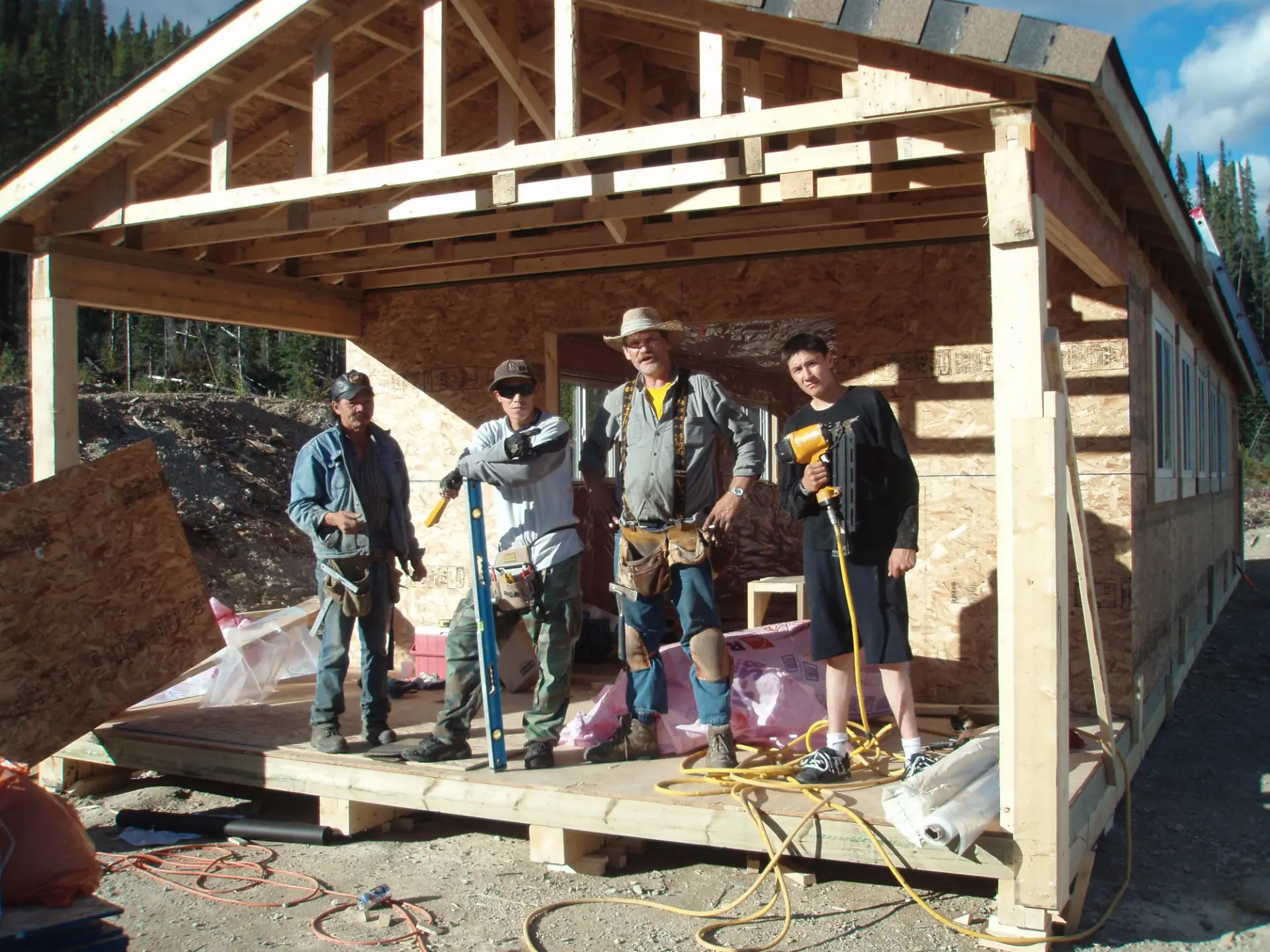 Construction crew from Kwadacha building the coreshack in 2007