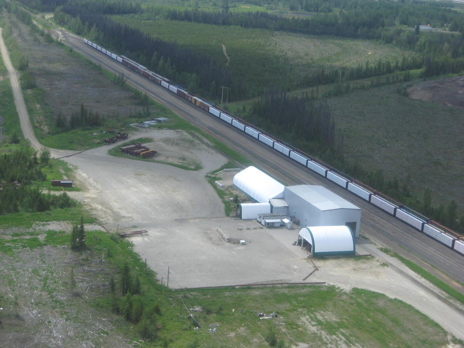 Aerial view of the concentrate loadout facility at Mackenzie, BC, used by the Mt. Milligan Cu-Au mine.