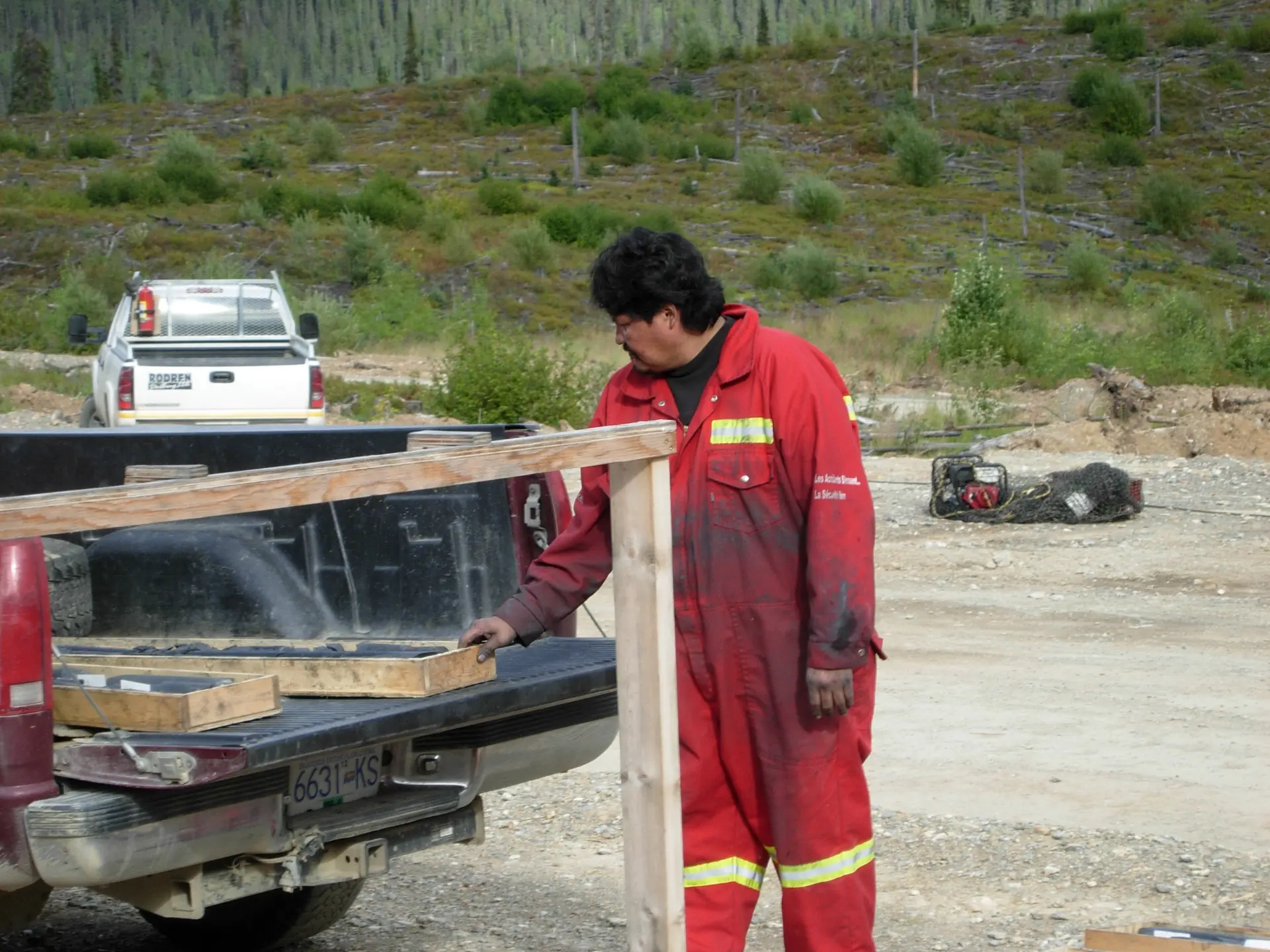 Local help from the community of Tsay Keh Dene. Core cutter Henry Isaac