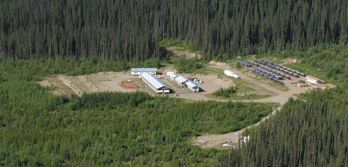 Aerial view of the Akie exploration camp, a 45-man ATCO trailer style camp built in a forestry cut-block along the Akie Mainline FSR.